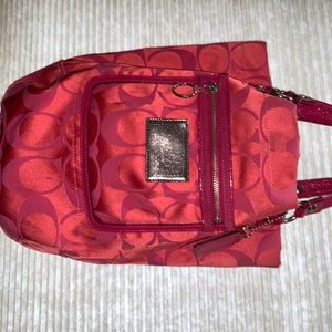 Coach bag poppy pink great bag has a clip inside to keep personal items secure